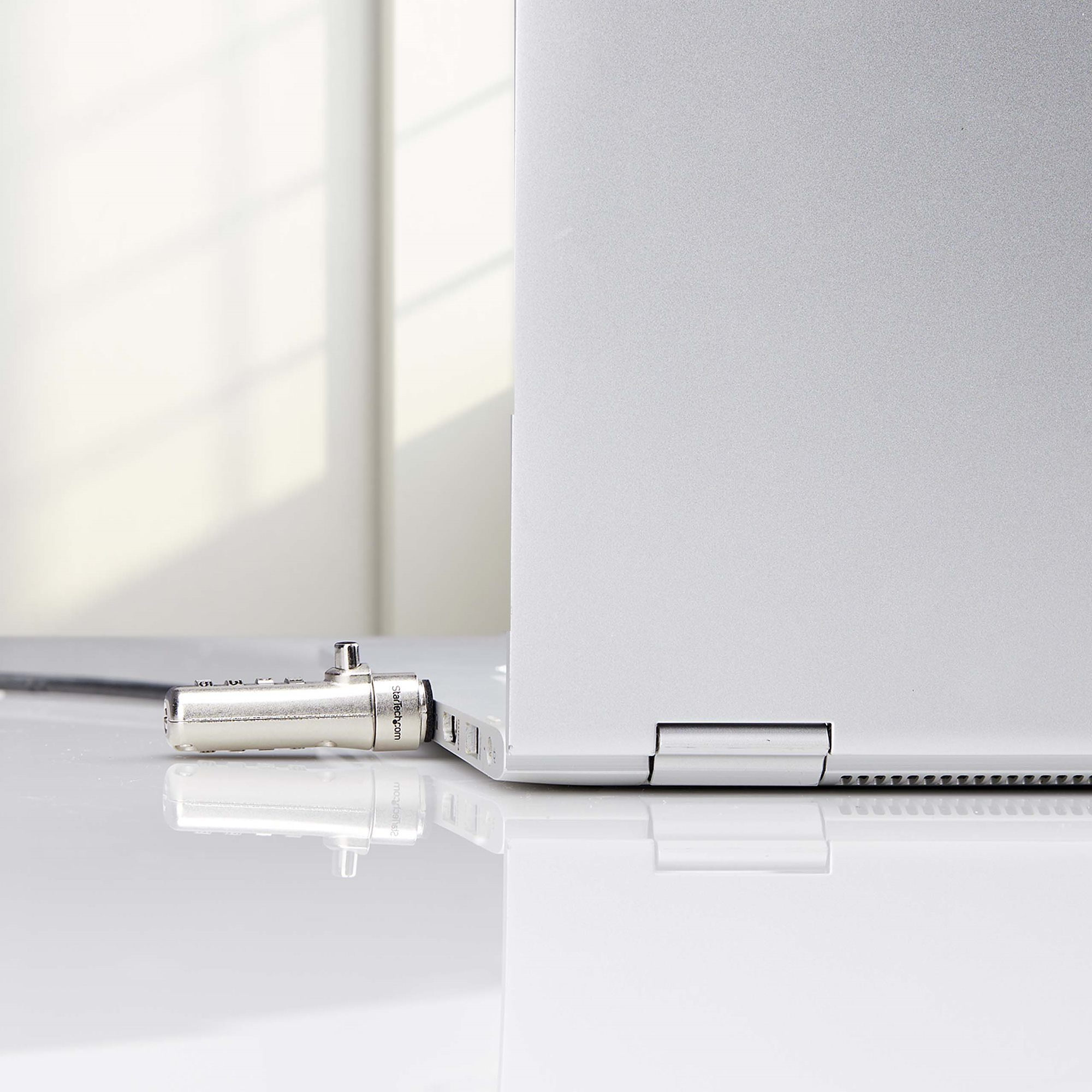StarTech.com Nano Compatibel Laptop Kabelslot, 1,5m Slim Lock Laptop Beveiligingskabel, Anti-Diefstal Slot voor Laptop/Notebook Computer, Snijbestendige Kabel, 4-Cijferslot - Afbeelding 6